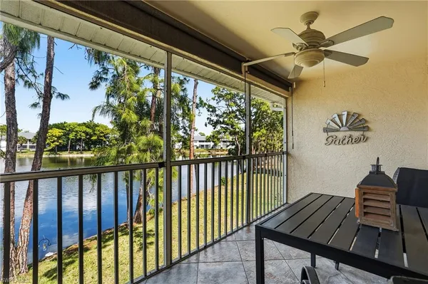 a view of a balcony with furniture