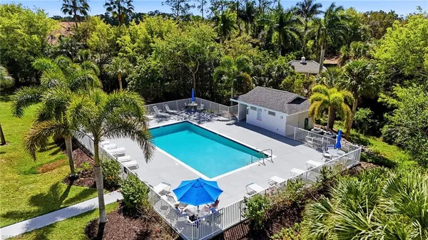 an aerial view of a house with outdoor space