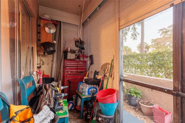 a view of a balcony with chair