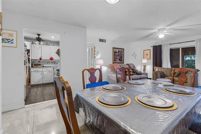 a view of a dining room with furniture