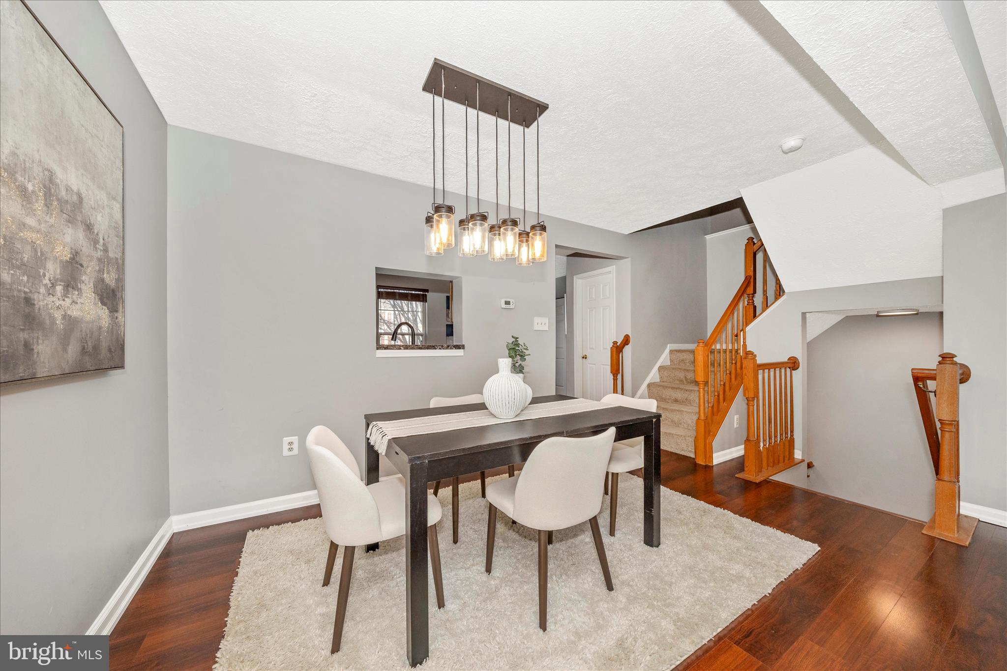 1511 Beverly Court Frederick, MD 21701 - Photo 15 of 72 a view of a dining room with furniture and wooden floor