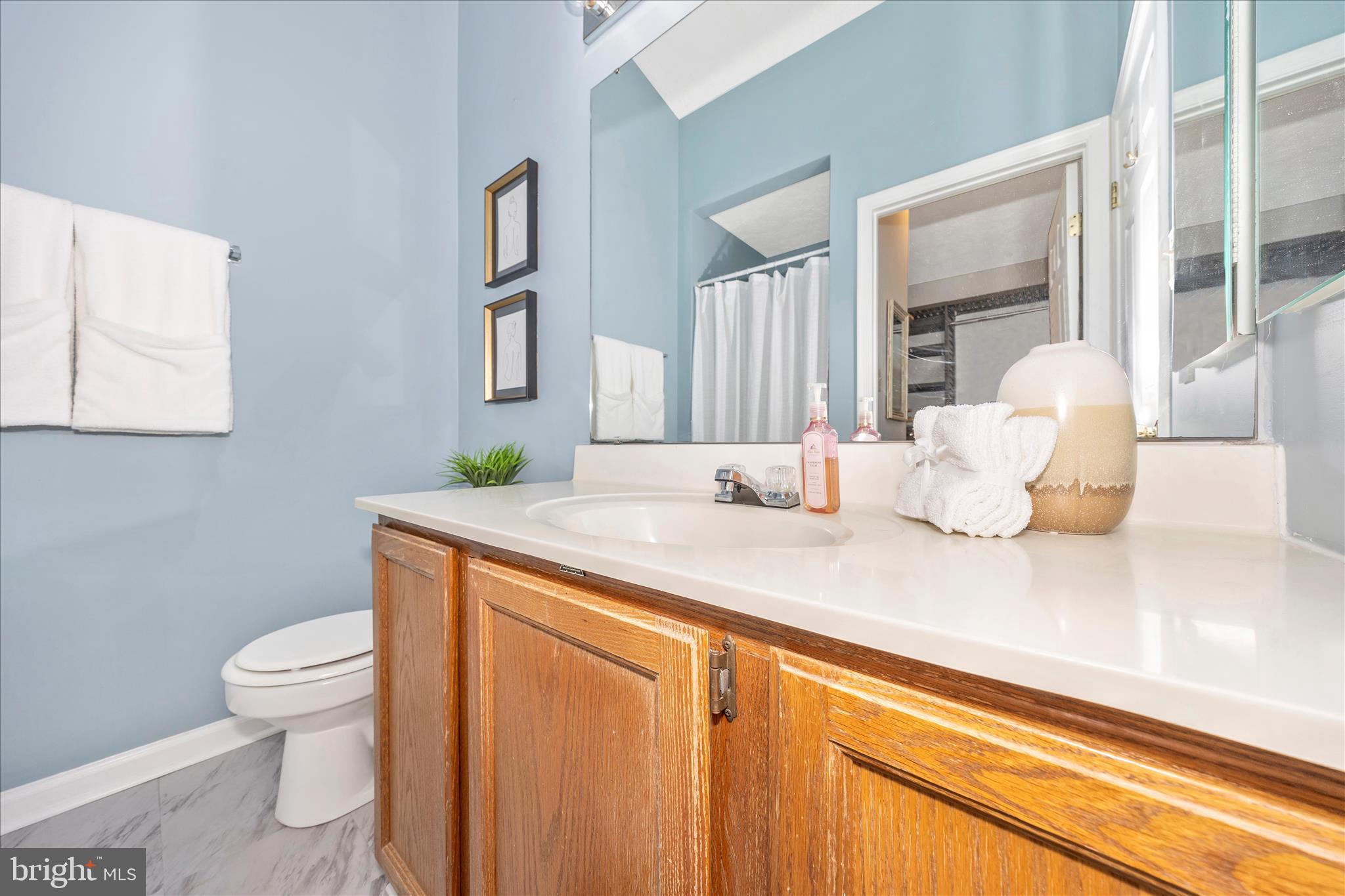 1511 Beverly Court Frederick, MD 21701 - Photo 27 of 72 a bathroom with a granite countertop sink and a mirror