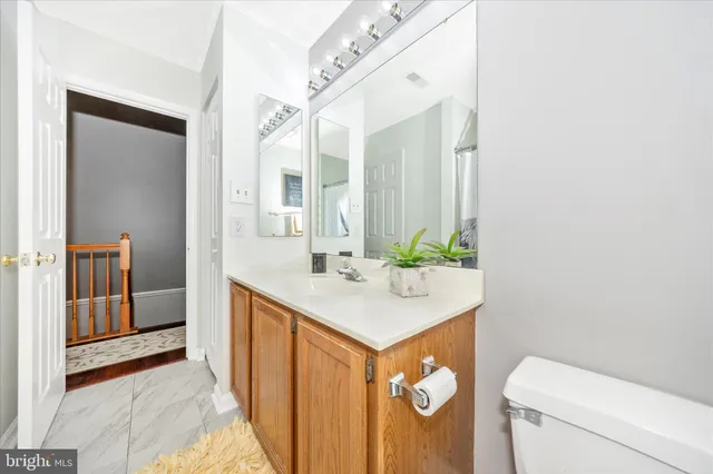 a front view of a house with many windows