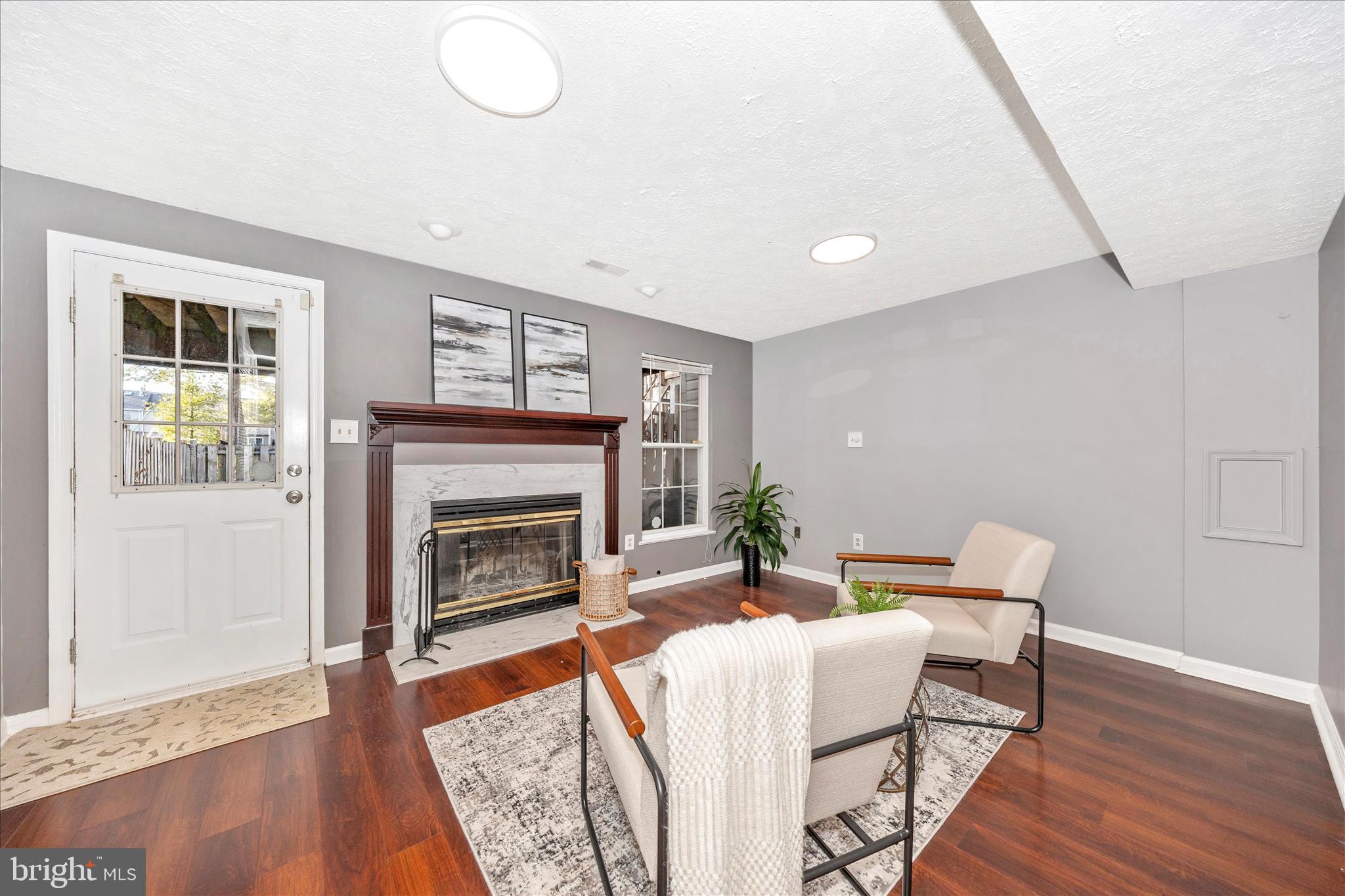 1511 Beverly Court Frederick, MD 21701 - Photo 4 of 72 a living room with furniture and a fireplace