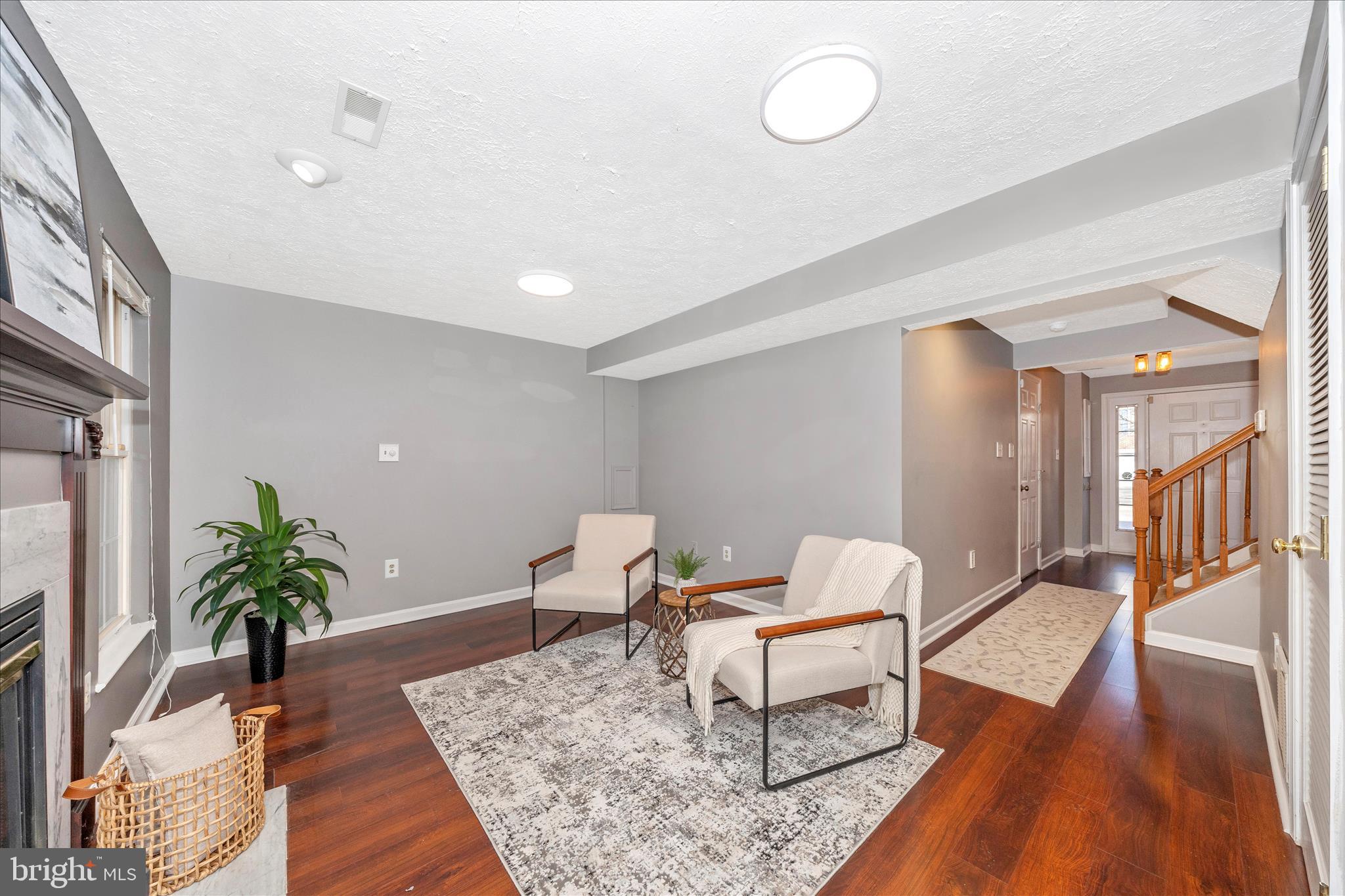 1511 Beverly Court Frederick, MD 21701 - Photo 5 of 72 a living room with furniture and a wooden floor