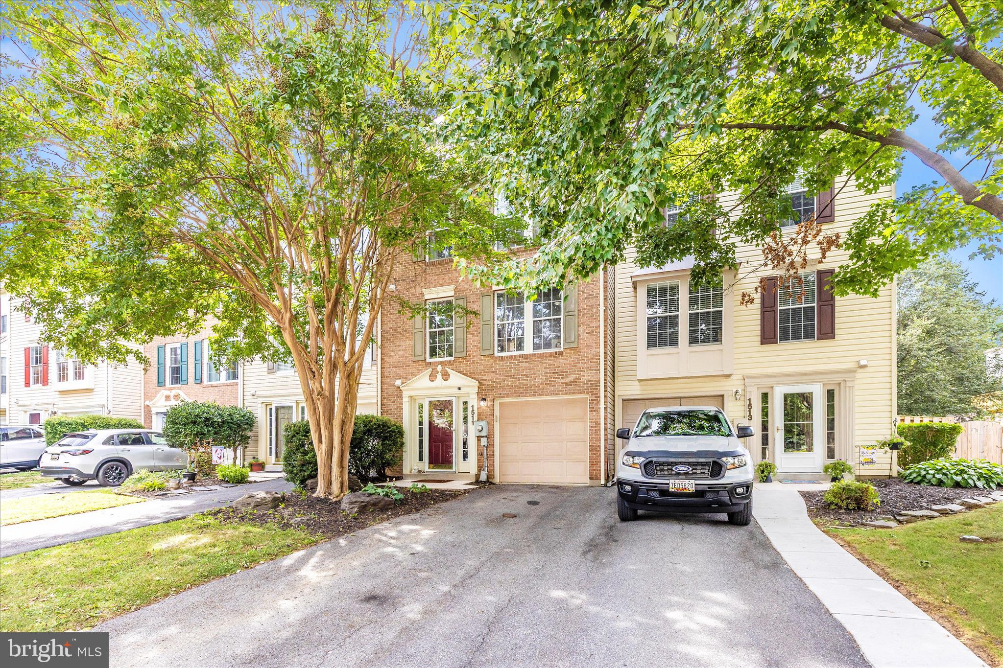 1511 Beverly Court Frederick, MD 21701 - Photo 57 of 72 a view of a house with a patio and a yard