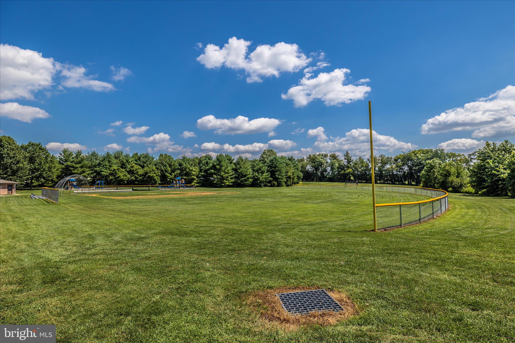 1511 Beverly Court Frederick, MD 21701 - Photo 63 of 72 a view of a golf course with a lake