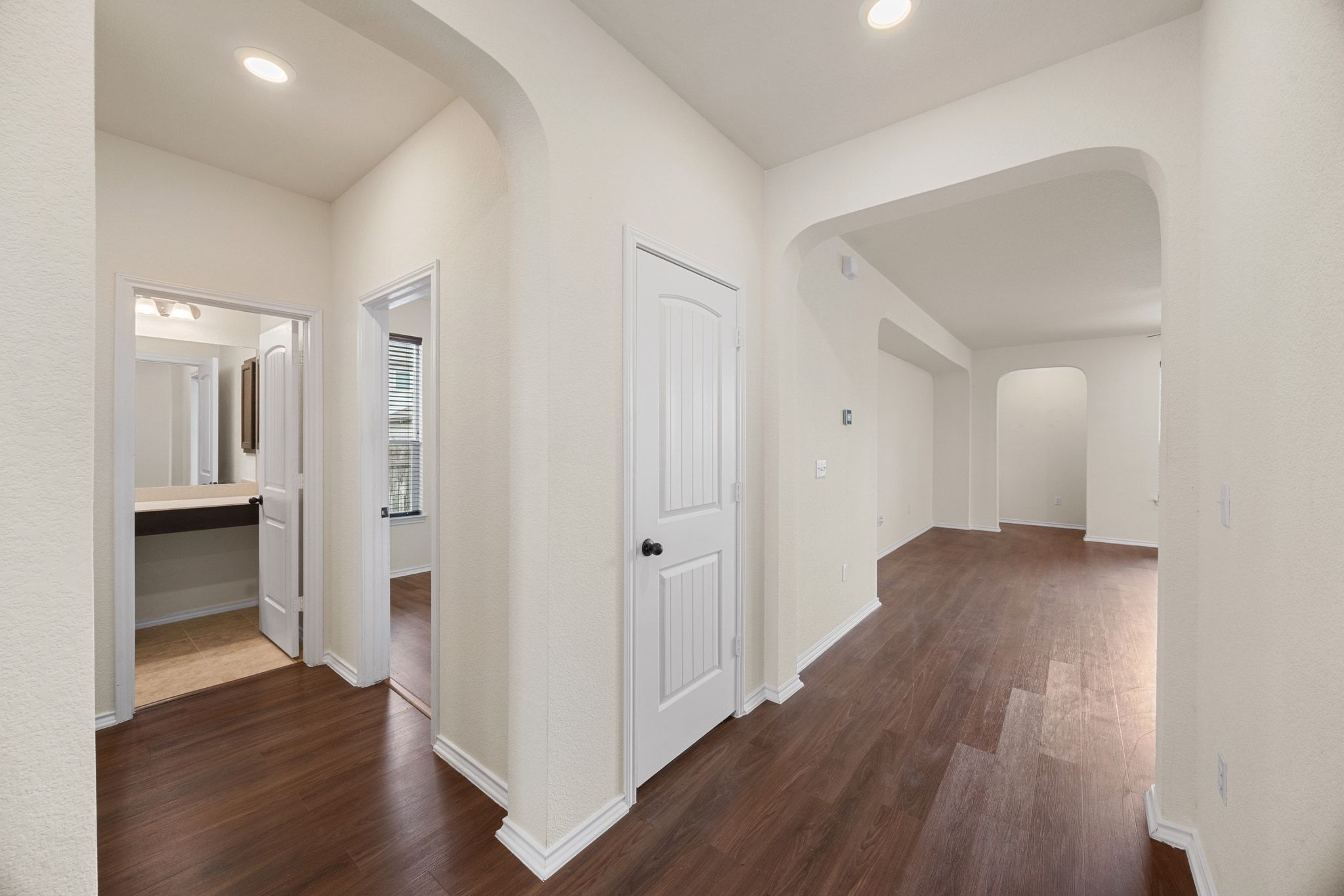 136 Vickers Street Georgetown, TX 78628 - Photo 21 of 33 a view of a hallway with wooden floor