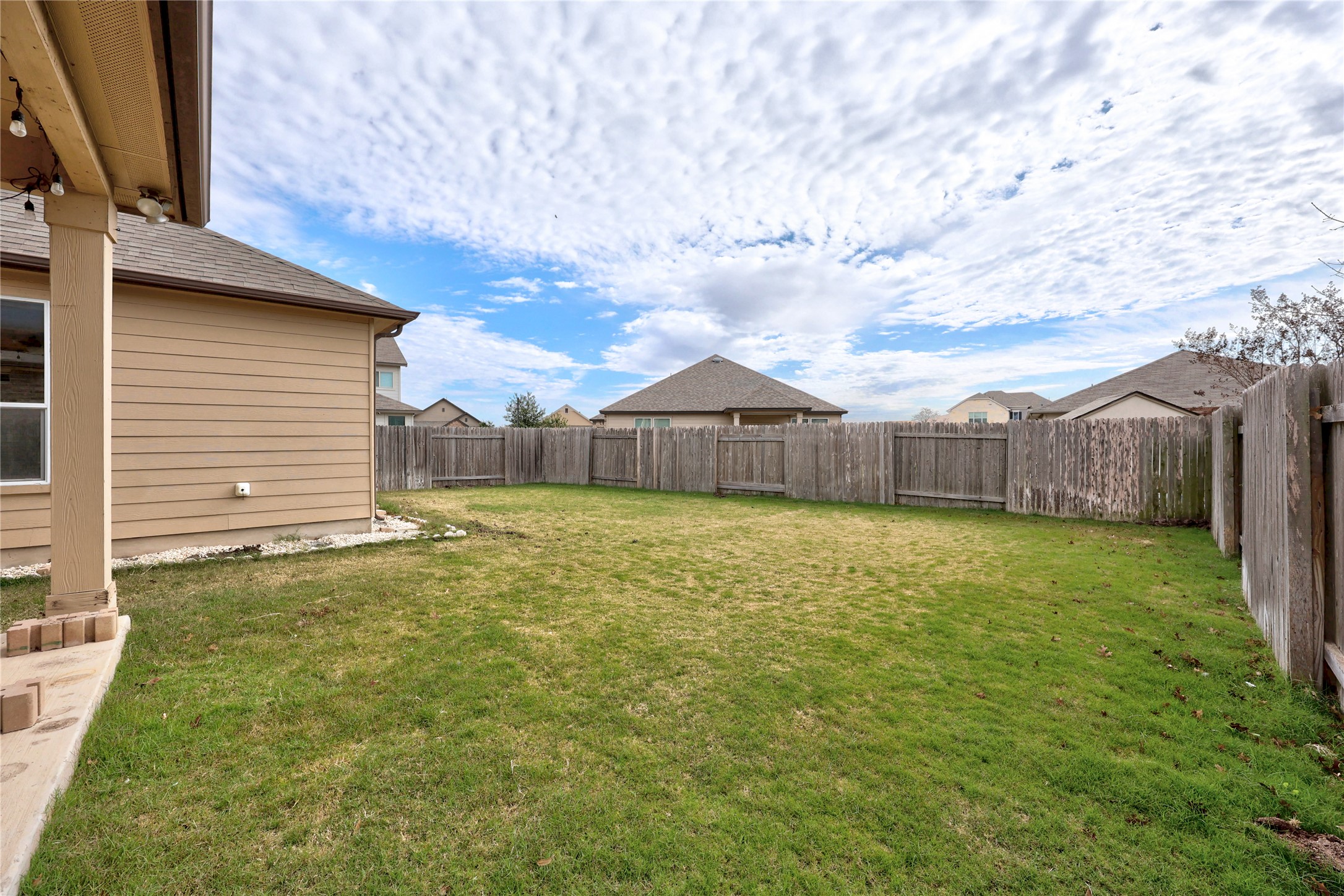 136 Vickers Street Georgetown, TX 78628 - Photo 28 of 33 a view of a backyard