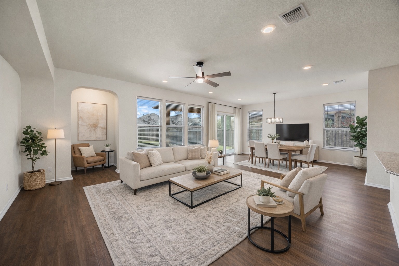 136 Vickers Street Georgetown, TX 78628 - Photo 6 of 33 a living room with fireplace furniture and a large window