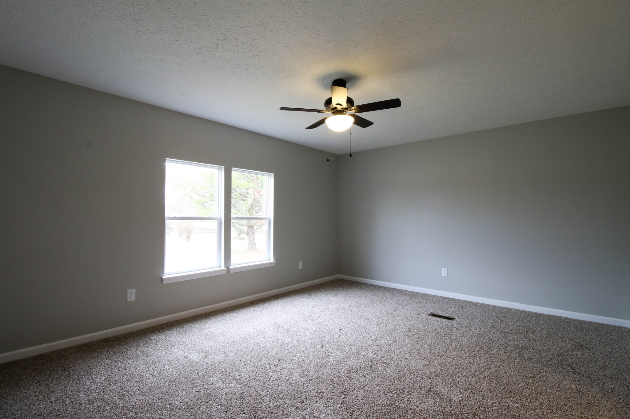 4413 Woodrow Wilson Road Springfield, TN 37172 - Photo 12 of 19 an empty room with a window and a ceiling fan