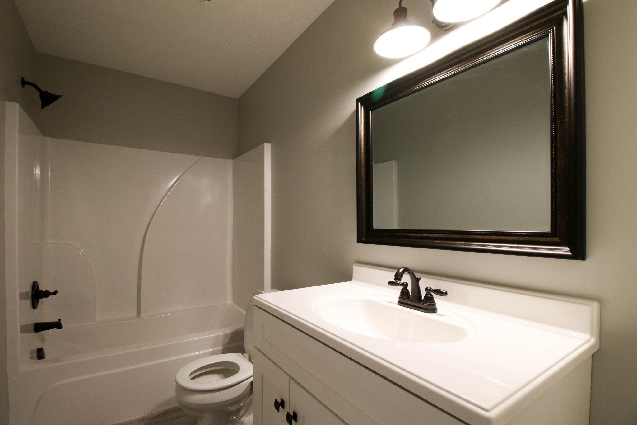 4413 Woodrow Wilson Road Springfield, TN 37172 - Photo 19 of 19 a bathroom with a sink a toilet and bathtub