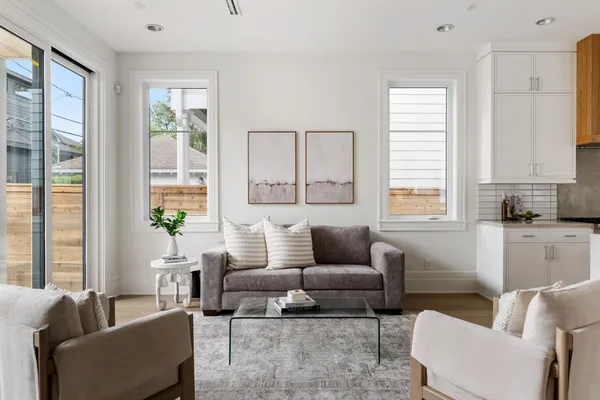 a living room with furniture and a window