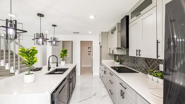 a kitchen with counter top space and appliances