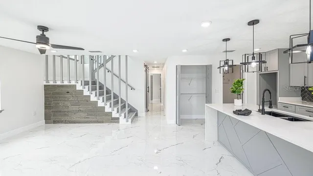 a view of entryway and hall with a bath tub
