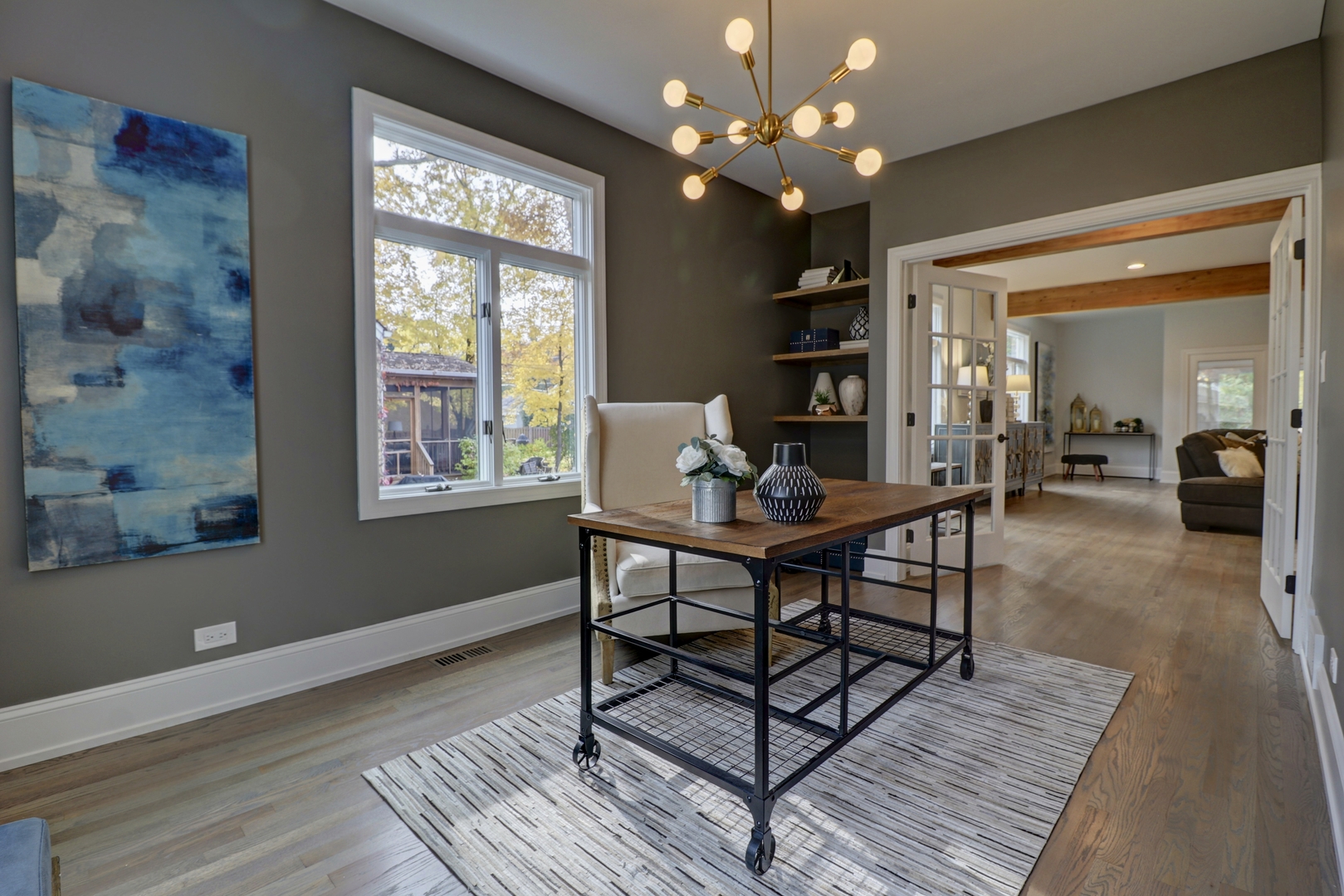 3910 Wolf Road Western Springs, IL 60558 - Photo 12 of 36 a view of a livingroom with furniture window and wooden floor