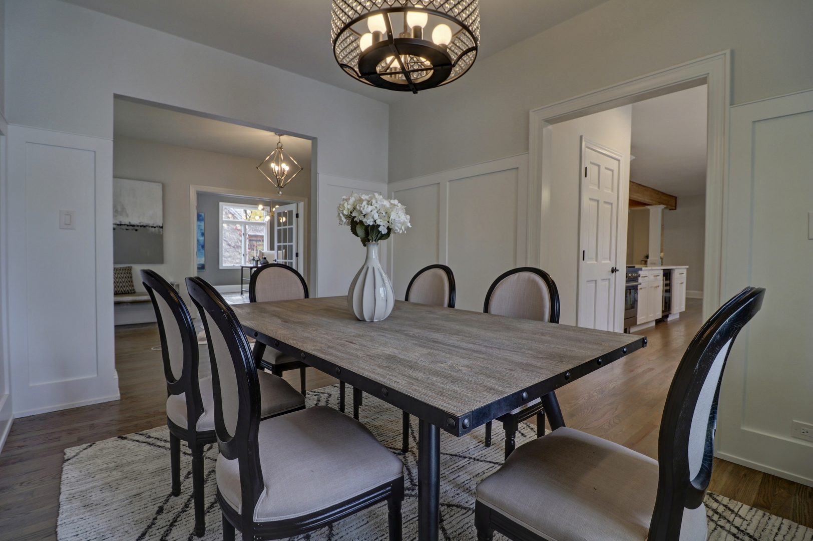 3910 Wolf Road Western Springs, IL 60558 - Photo 13 of 36 a view of a dining room with furniture and chandelier