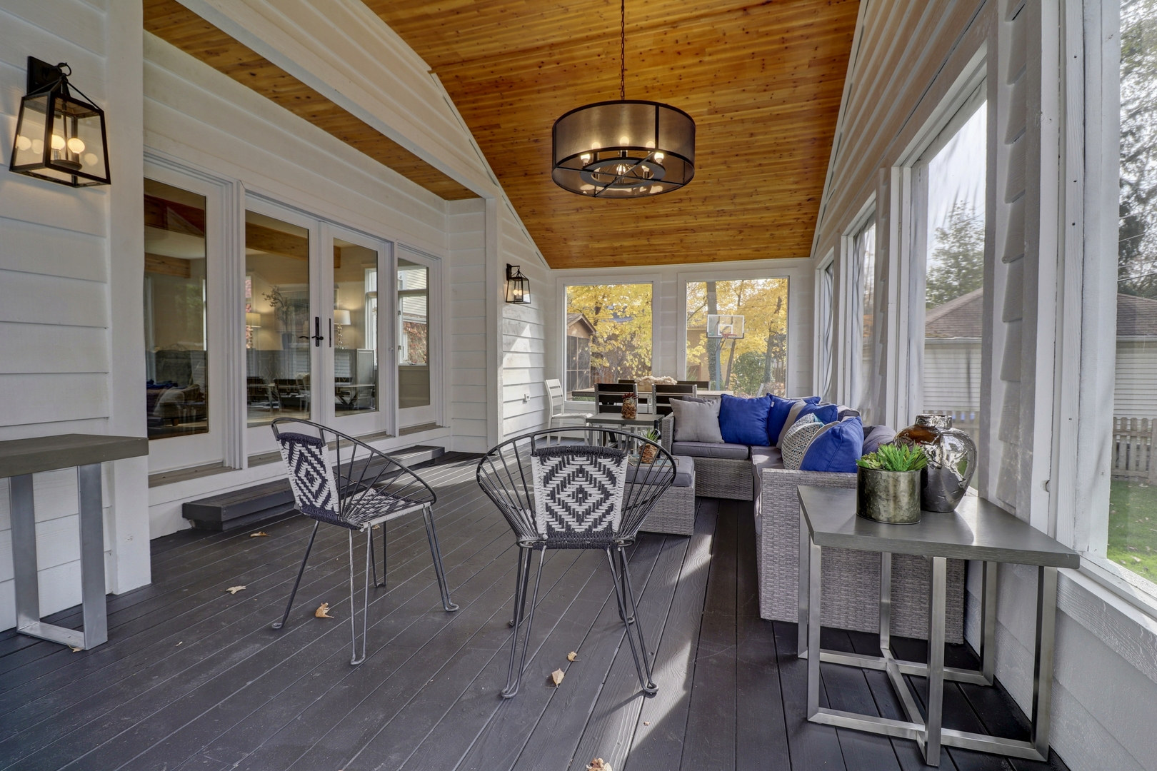 3910 Wolf Road Western Springs, IL 60558 - Photo 16 of 36 a view of a dining room with furniture wooden floor and chandelier