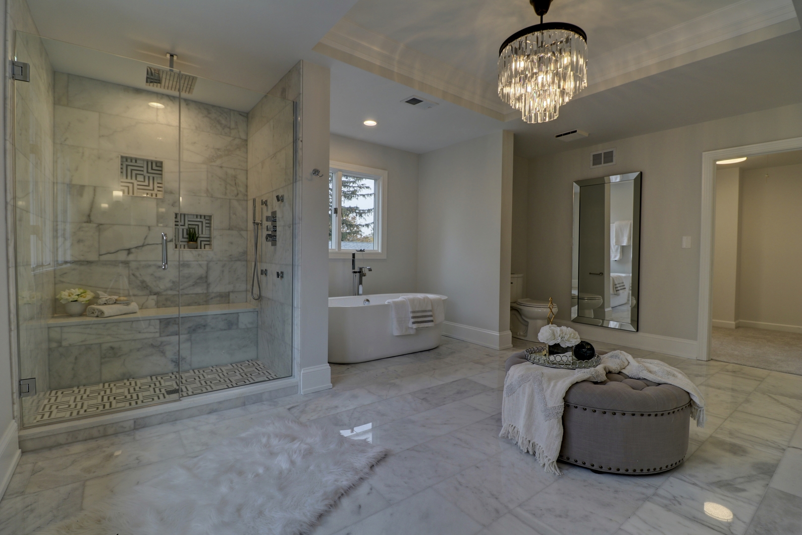 3910 Wolf Road Western Springs, IL 60558 - Photo 23 of 36 a spacious bathroom with a glass door shower and a sink
