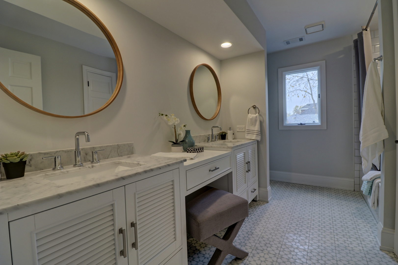 3910 Wolf Road Western Springs, IL 60558 - Photo 31 of 36 a bathroom with a double vanity sink double and a mirror