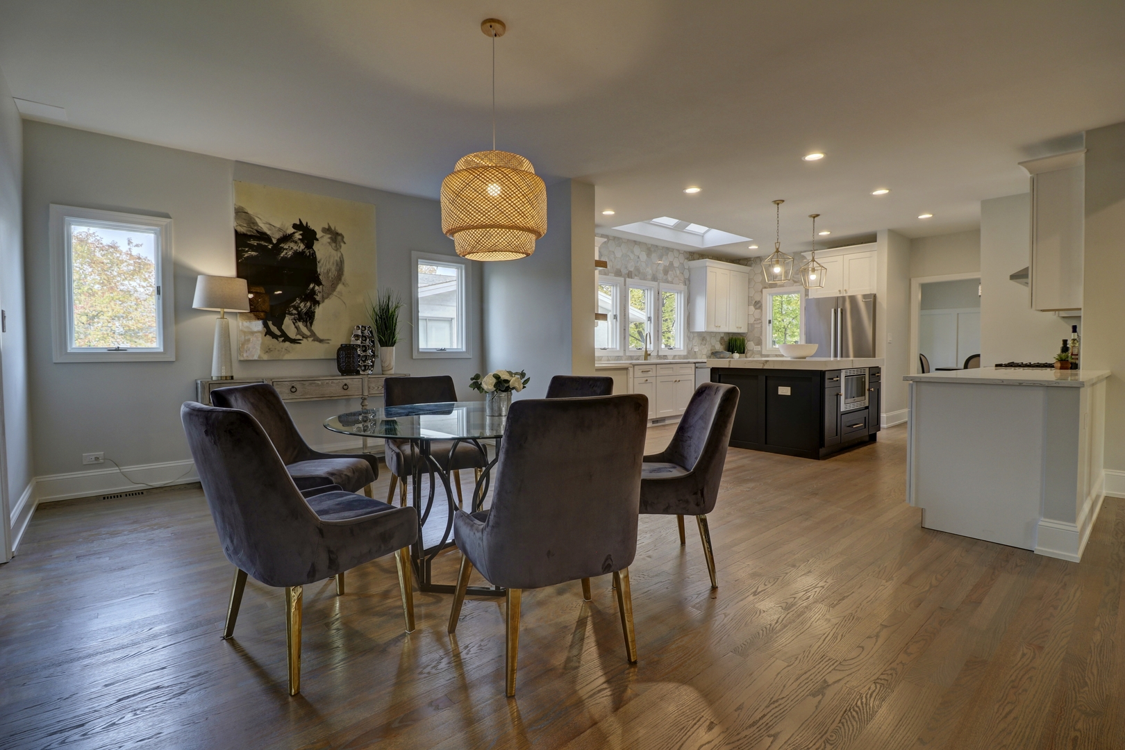 3910 Wolf Road Western Springs, IL 60558 - Photo 6 of 36 a view of a dining room with furniture and wooden floor