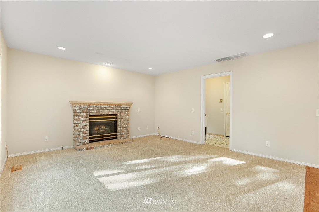19907 29th Drive Southeast Bothell, WA 98012 - Photo 12 of 25 a view of an empty room with a fireplace