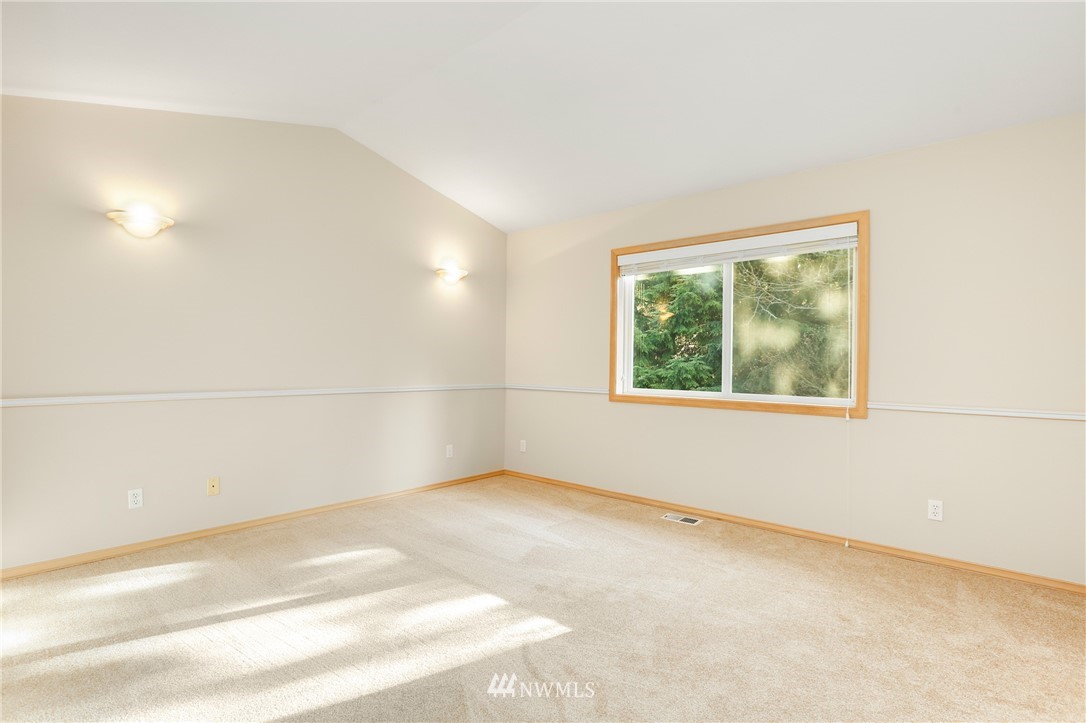 19907 29th Drive Southeast Bothell, WA 98012 - Photo 13 of 25 an empty room with a window