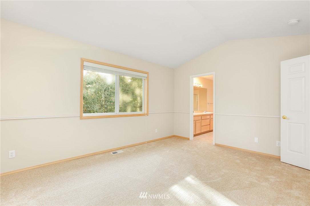 19907 29th Drive Southeast Bothell, WA 98012 - Photo 14 of 25 an empty room with windows