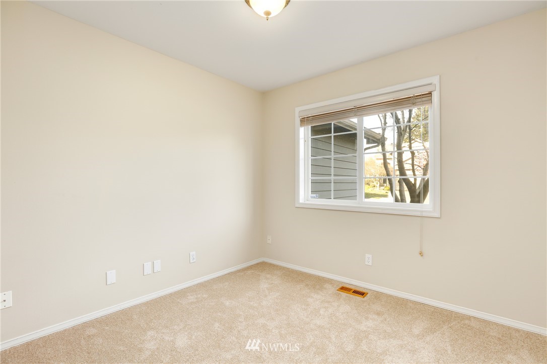 19907 29th Drive Southeast Bothell, WA 98012 - Photo 17 of 25 an empty room with a window