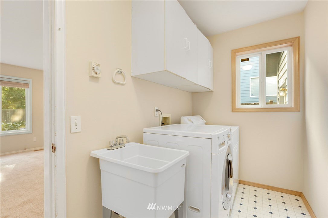 19907 29th Drive Southeast Bothell, WA 98012 - Photo 23 of 25 a utility room with dryer and washer
