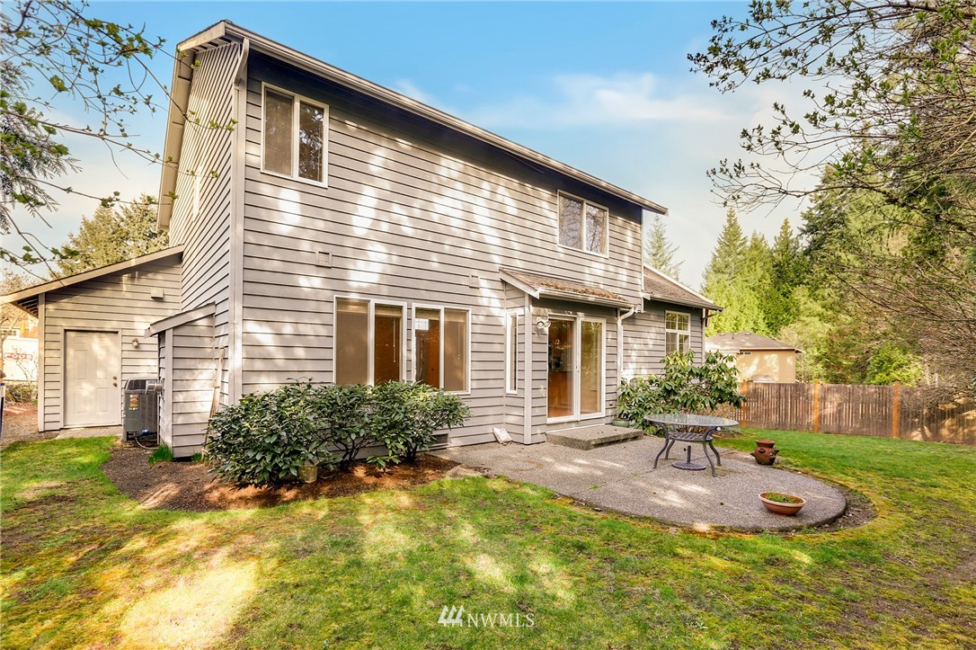 19907 29th Drive Southeast Bothell, WA 98012 - Photo 24 of 25 a front view of a house with a yard
