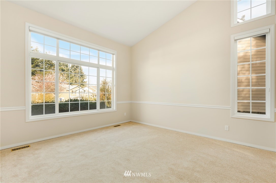 19907 29th Drive Southeast Bothell, WA 98012 - Photo 10 of 25 an empty room with a window
