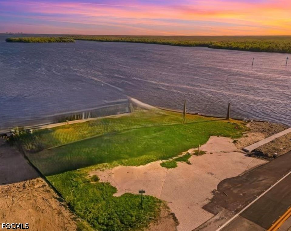 4767 Pine Island Road Matlacha, FL 33993 - Photo 5 of 12 a view of an outdoor space and a lake