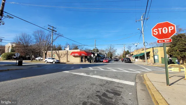 a view of a street with cars