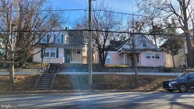 a front view of a house with garage