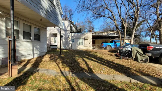 a view of a chairs and tables in the patio