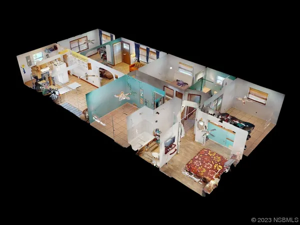 an aerial view of a house an outdoor space and seating area