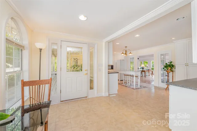 a view of a livingroom with furniture and a window