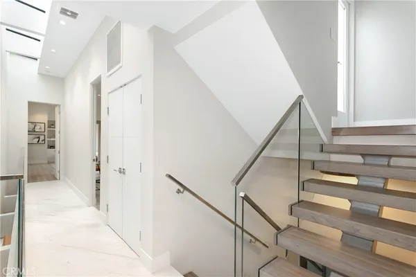 a view of a balcony with chairs