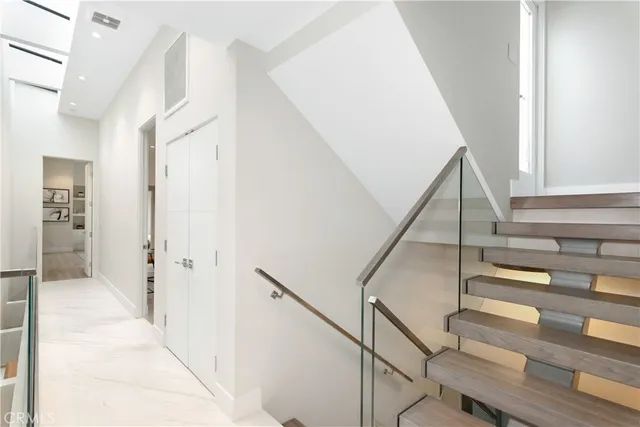 a view of a balcony with chairs