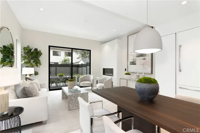 a kitchen with a table and chairs