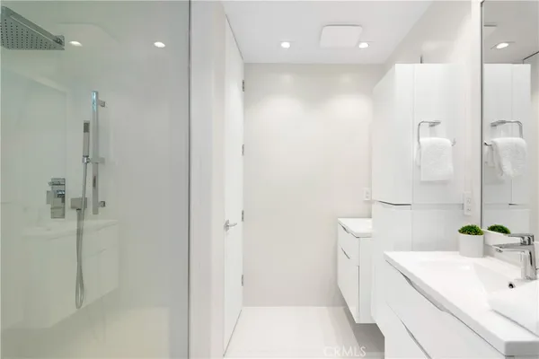 a bathroom with a shower and a bathtub