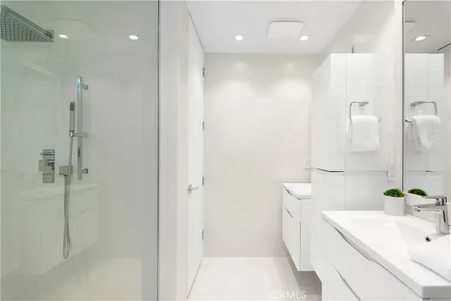 a bathroom with a shower and a bathtub