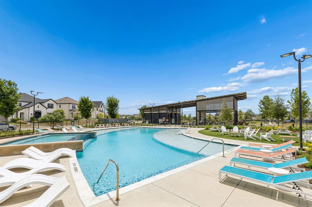3004 Windy Rdg Road McKinney, TX 75071 - Photo 39 of 40 a view of a swimming pool with lounge chairs