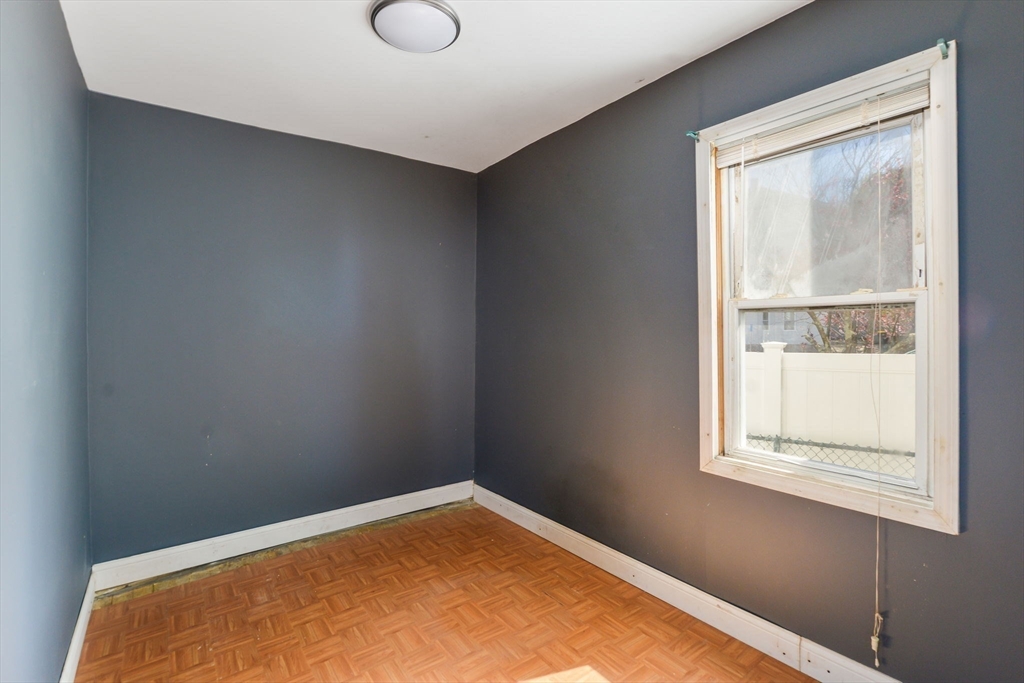 58 Downing Street Fall River, MA 02723 - Photo 12 of 41 a view of a room with a window