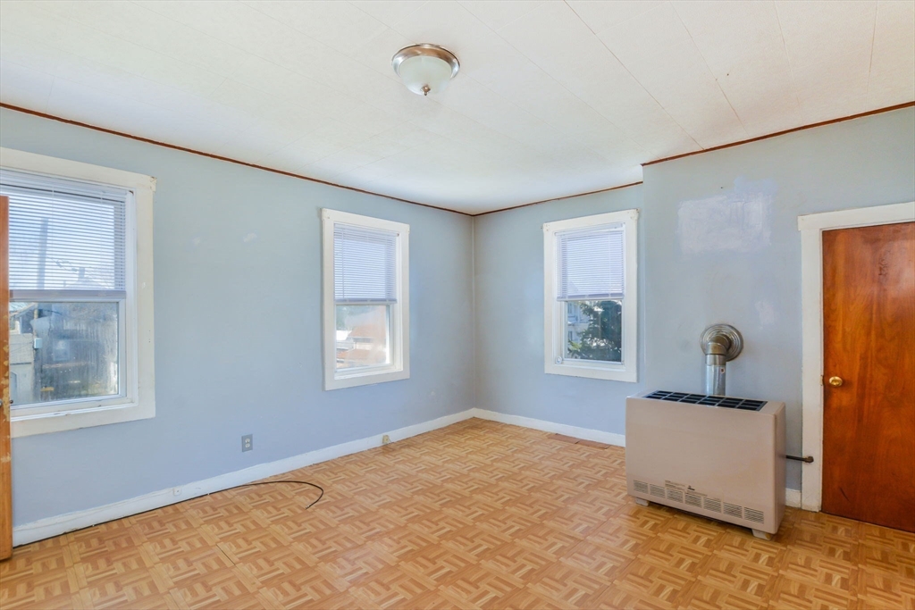 58 Downing Street Fall River, MA 02723 - Photo 15 of 41 a bedroom with windows
