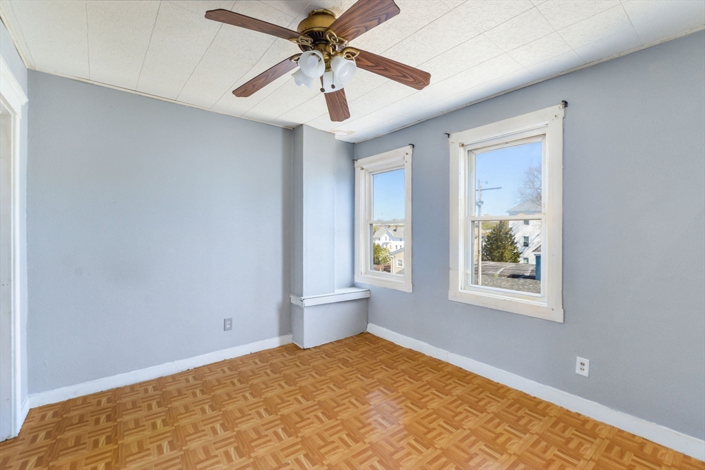 58 Downing Street Fall River, MA 02723 - Photo 17 of 41 a view of an empty room and window