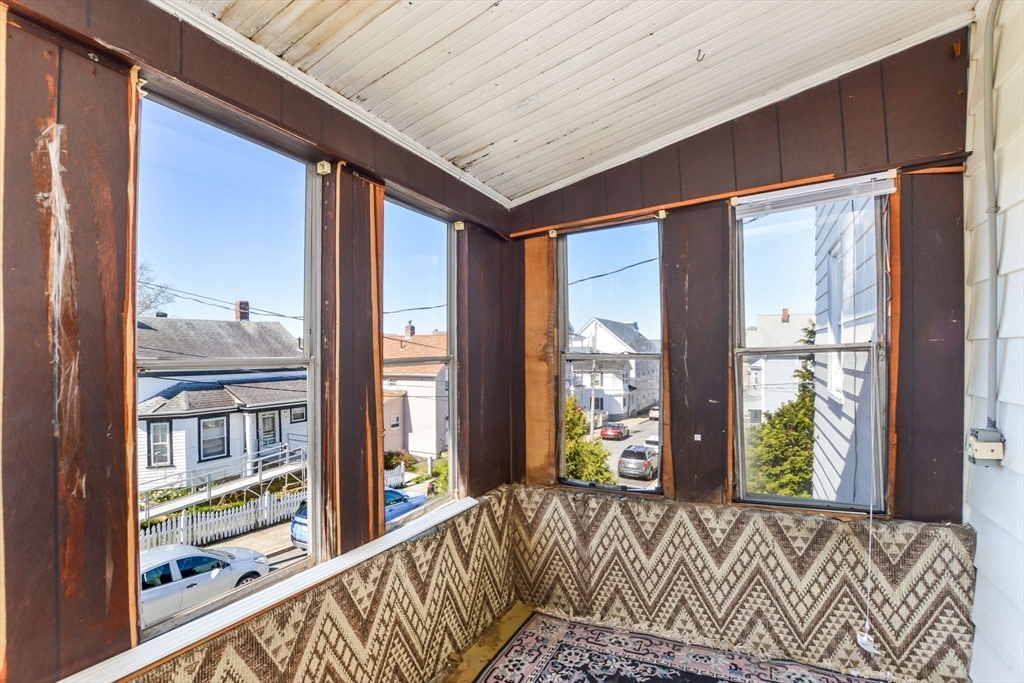58 Downing Street Fall River, MA 02723 - Photo 25 of 41 a front view of a house with a large window