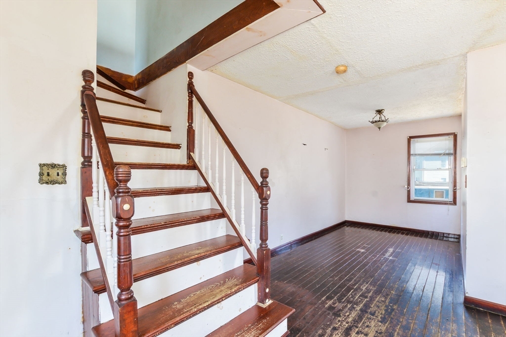 58 Downing Street Fall River, MA 02723 - Photo 30 of 41 a view of entryway with wooden floor and stairs