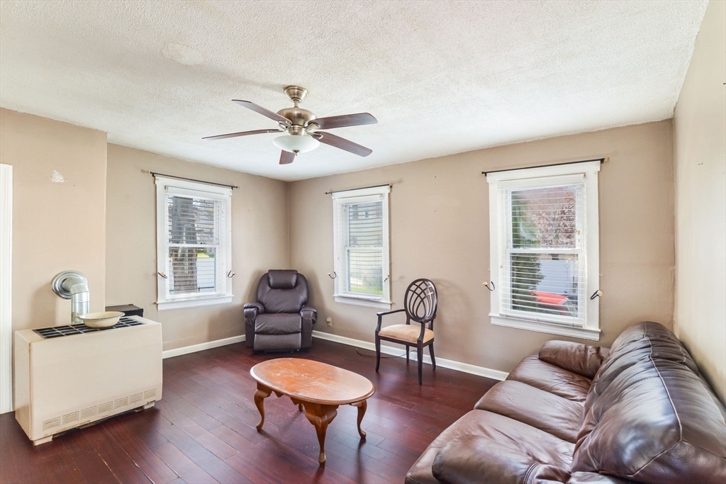 58 Downing Street Fall River, MA 02723 - Photo 4 of 41 a living room with furniture and a window